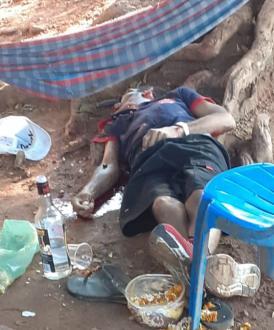 Human trashed, shot and left with knife in the eye