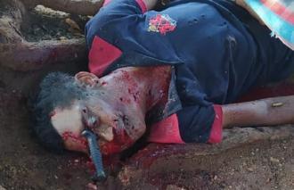 Human trashed, shot and left with knife in the eye