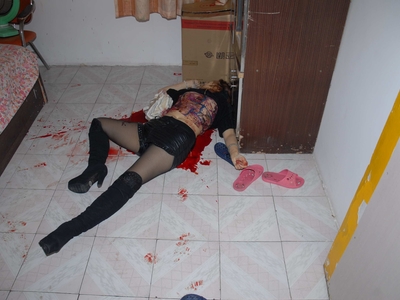 Prostitute found dead in room (examined)