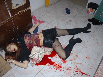 Prostitute found dead in room (examined)