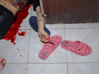 Prostitute found dead in room (examined)