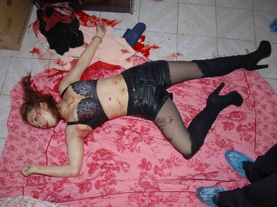 Prostitute found dead in room (examined)