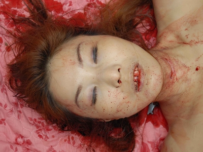 Prostitute found dead in room (examined)