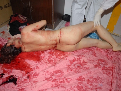 Prostitute found dead in room (examined)