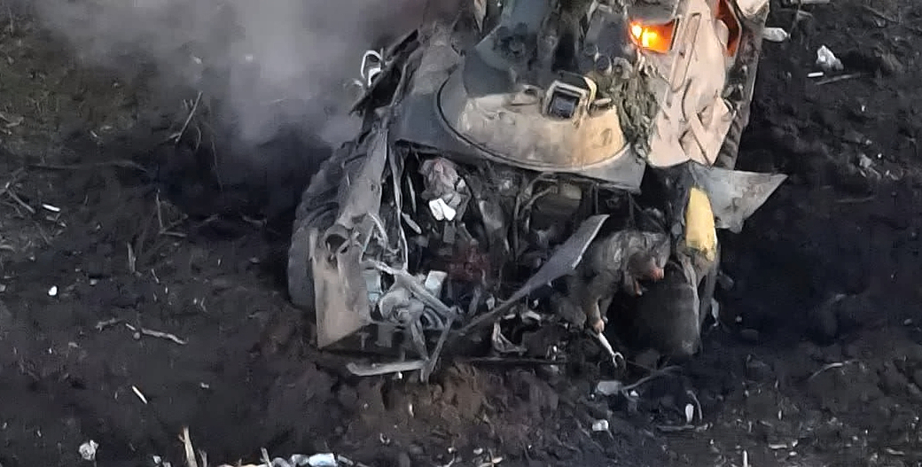 The immediate aftermath of a high-explosive mine blast...