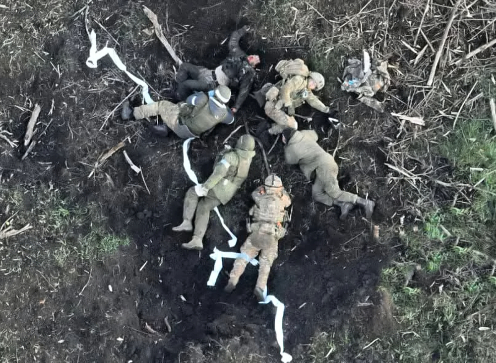 The immediate aftermath of a high-explosive mine blast...