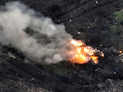 The immediate aftermath of a high-explosive mine blast...