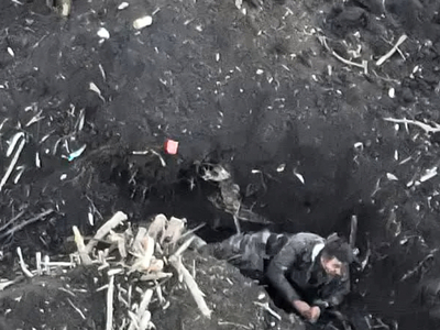 The immediate aftermath of a high-explosive mine blast...