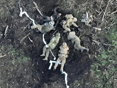 The immediate aftermath of a high-explosive mine blast...