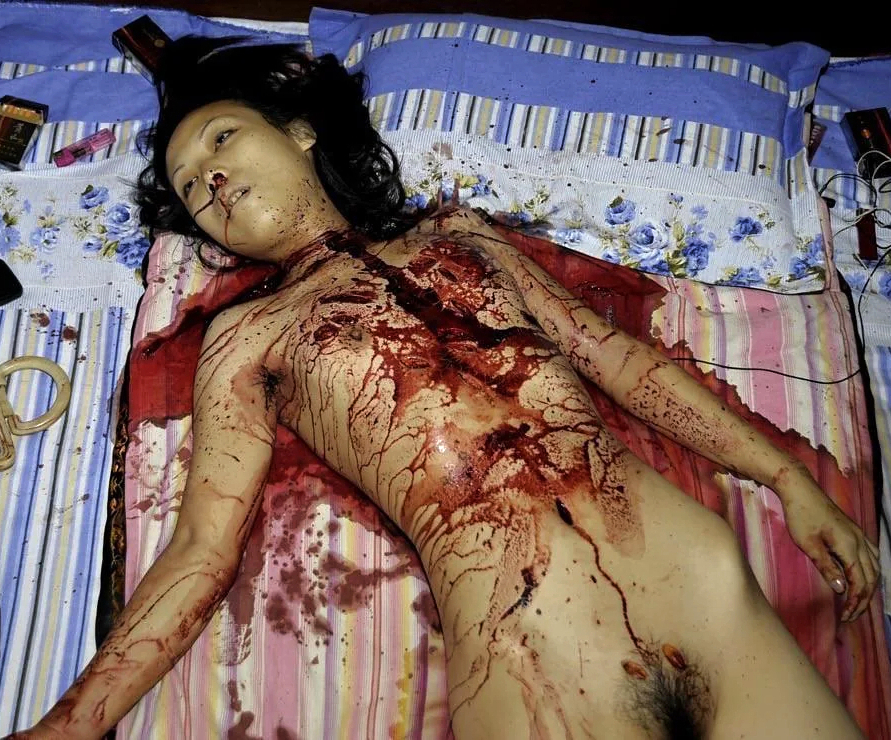 Woman stabbed to death with a partial autopsy at the scene