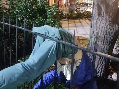 Impaled on railings.