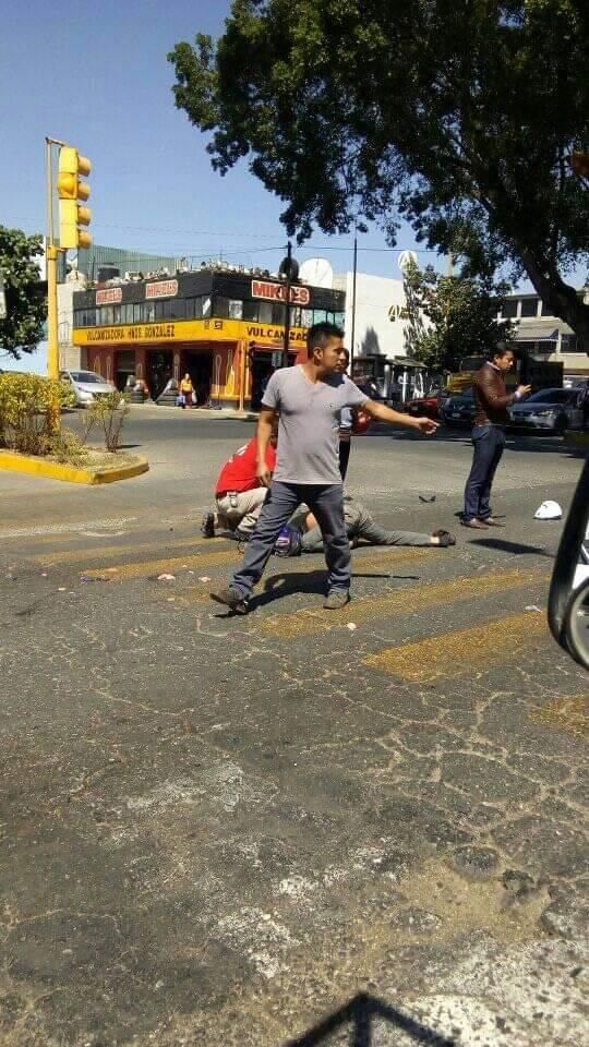 Moto Boy Dead on Road After Hitting Bus