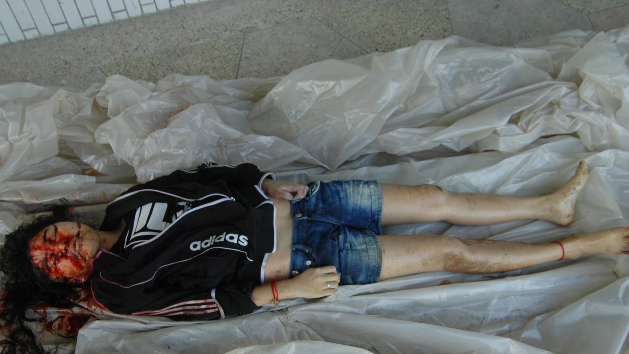 Brutally murdered Chinese woman - Autopsy