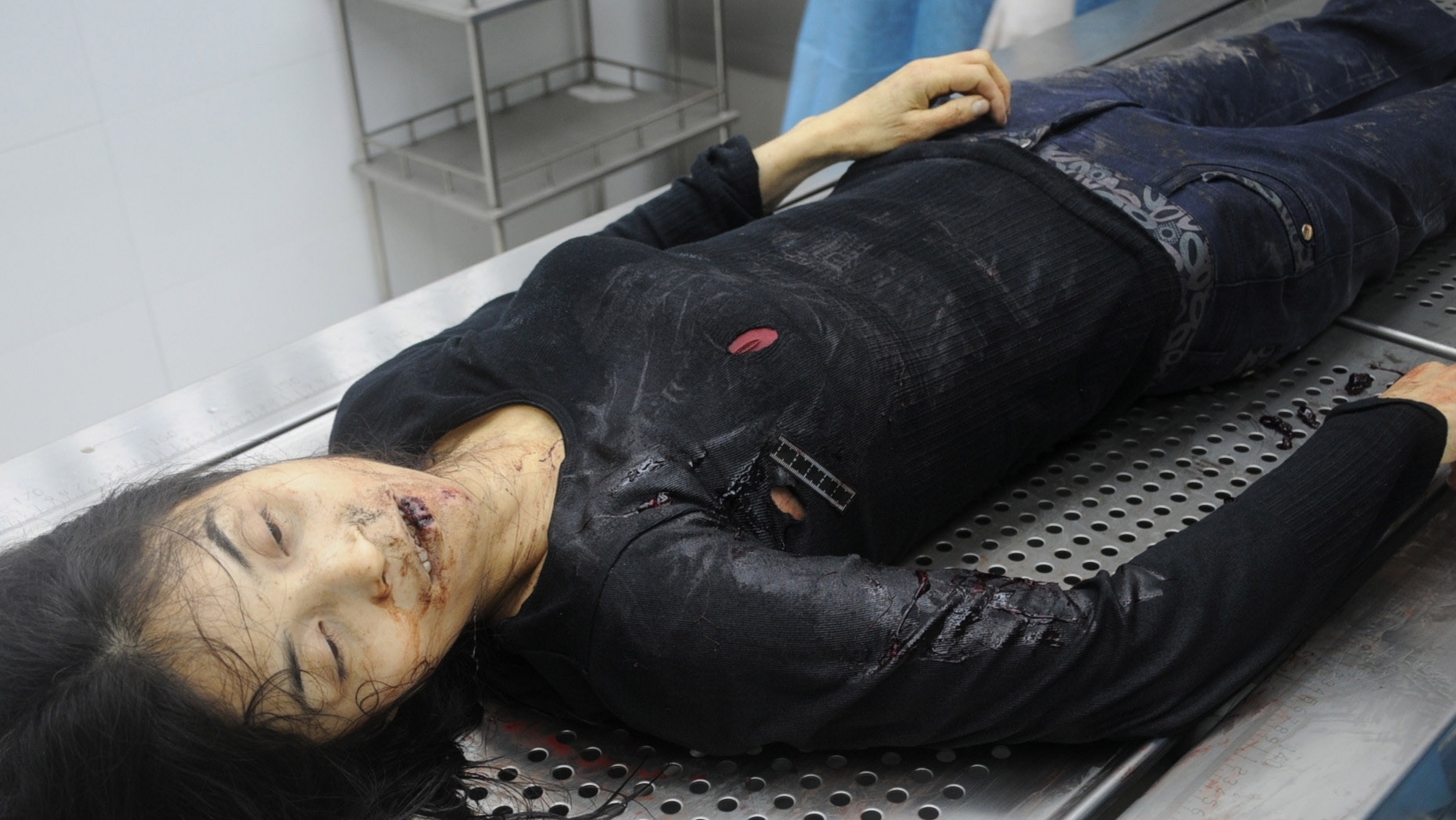 Detailed dissection of stabbed Chinese woman