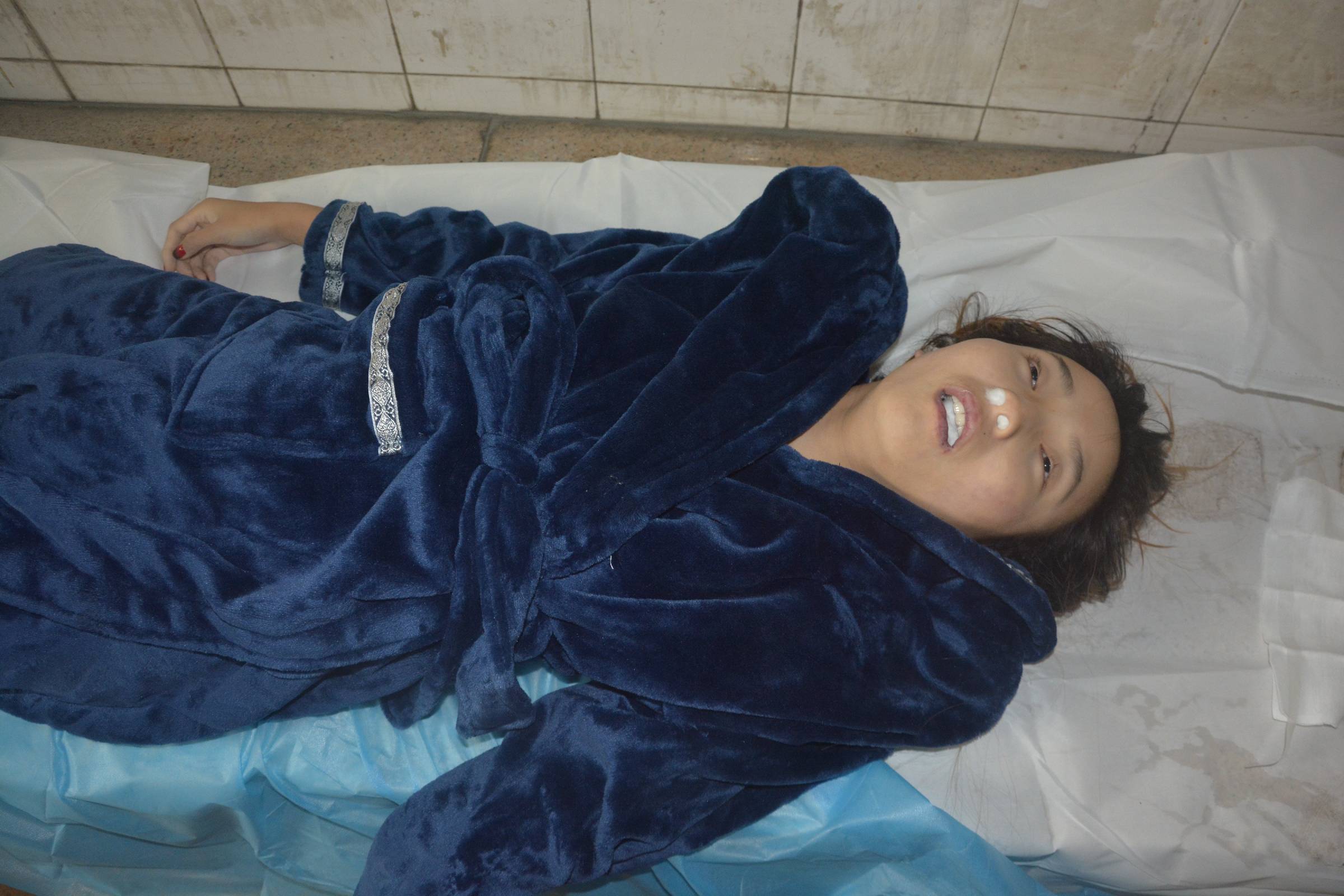 Pretty Chinese girl naked in morgue