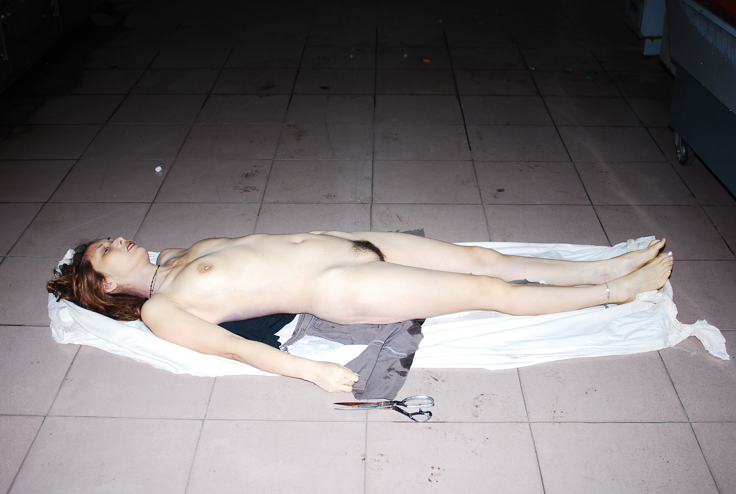 Chinese woman naked in morgue