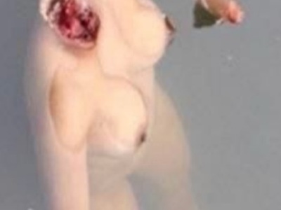 Headless & Armless Nude Woman Floating in the River 