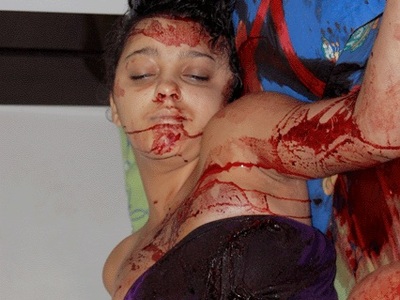 Sexy woman stabbed to death by her jealous husband 