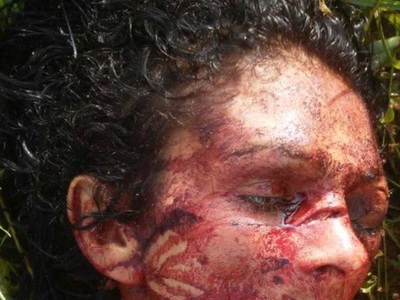 Meth head prostitute found stabbed to death .