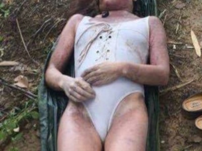 Sexy young woman in swimsuit drowned.