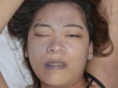 Examination corps of dead Chinese woman killed in hotel room 