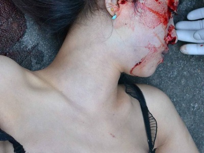 Sexy tattooed Chinese woman commit suicide by jumping from balcony 