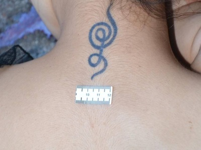 Sexy tattooed Chinese woman commit suicide by jumping from balcony 