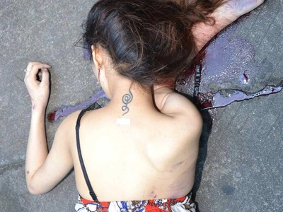 Sexy tattooed Chinese woman commit suicide by jumping from balcony 