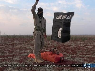 Caliphate soldiers beheaded an officer of the rank of (colonel) 
