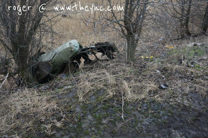 Ukraine: bodies & destroyed vehicles.