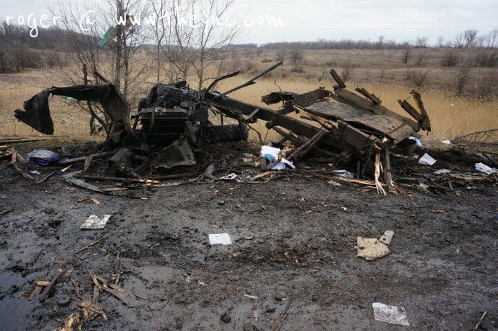 Ukraine: bodies & destroyed vehicles.