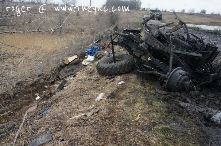 Ukraine: bodies & destroyed vehicles.