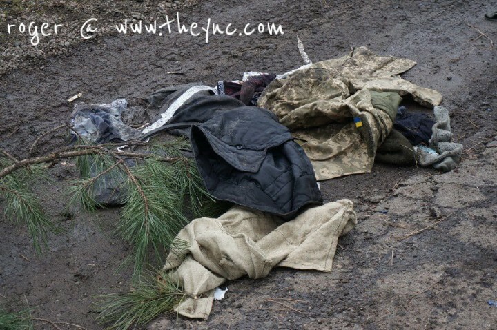 Ukraine: bodies & destroyed vehicles.