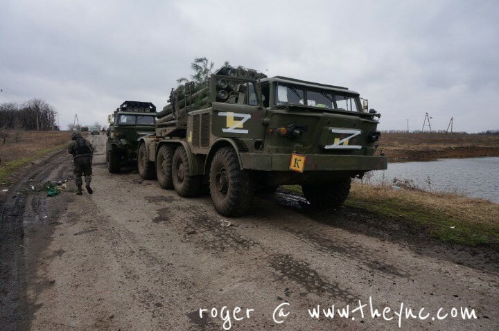 Ukraine: bodies & destroyed vehicles.