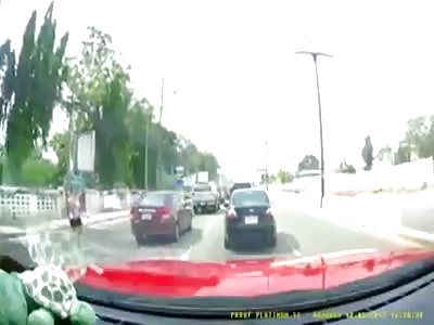 Woman is distracted by cell phone.