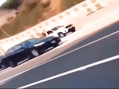 Homeless man walking through the freeway.