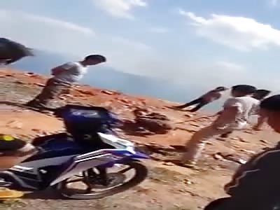 Thief beaten with sticks.