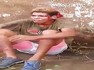 Teenage thief beaten by angry mob.