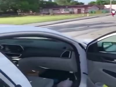 Women ran over by a car in front of her kids. USA.