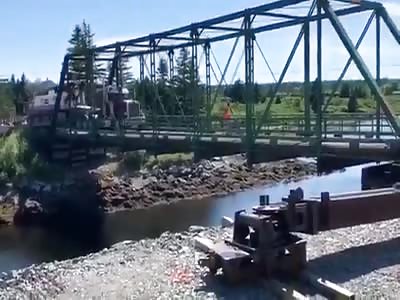 Bridge collapses in river 