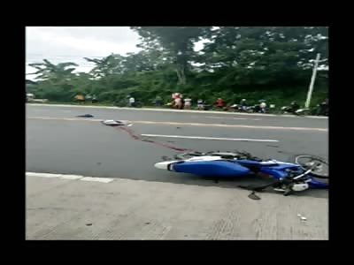 Woman's head cut off (Pictures in video of the scene)