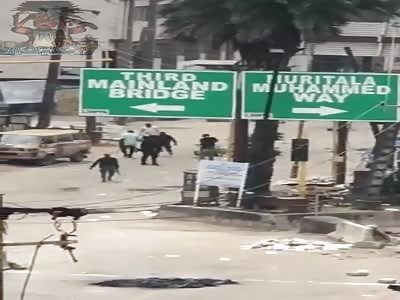 Protester executed in the street. 