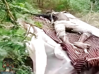 Rotten body of boy found after being partly burned.