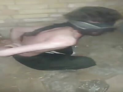 Prisoner Being Beaten with Pipe.