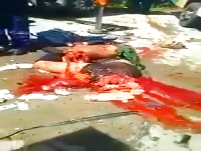 Cleaning a bloody mess, crushed corpse.