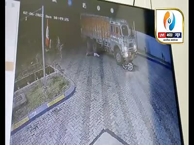 Scooterist Goes Under Truck 