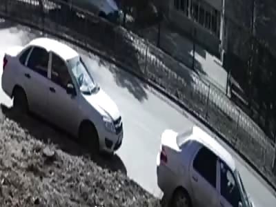 Guy Busy on Phone Gets Backed Over