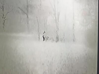 Ukrainian sniper takes out a Russian soldier. Bullets visible in fligh