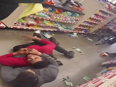 Store employees are trying to apprehend the thief