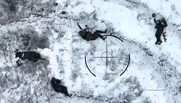 Several RU KIA are seen and their disabled BMP in the East